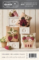 This picture shows the strawberry and ladybug pillows that can be made from the pattern.