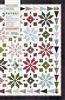 Woven Noel Quilt Pattern by Basic Grey shows a quilt featuring large snowflake blocks, perfect as a Christmas, Holiday or Winter Quilt.