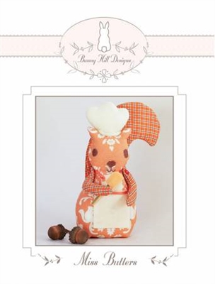 Miss Butters  Squirrel Chef Pattern from Bunny Hill Designs shows a small stuffed squirrel dressed with a chef hat.