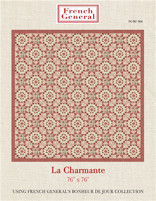 This rectangular block quilt has a diamond shape in the center of each quilt and is shown in vintage red, cream and taupe fabrics by French General.