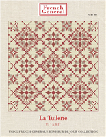 This is an intricate red, cream and taupe quilt pattern with a diagonal set.