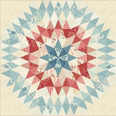 Liberty Star Quilt Pattern cover shows a the red, white and blue kaleidoscope quilt.