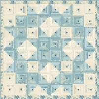 Pioneer Log Cabin Quilt Kit  by Laundry Basket Quilts makes a small log cabin blocks in shades of blue and cream with a narrow outer floral border.