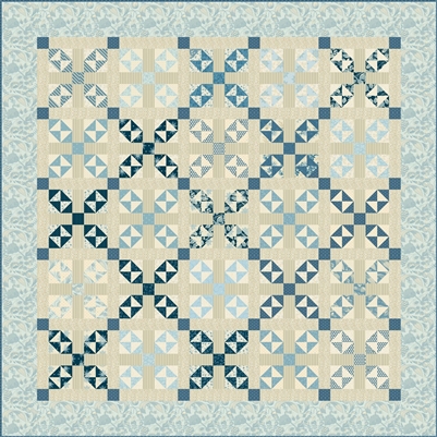 The Reef Quilt Pattern by Laundry Basket Quilts shows a traditional pieced quilt using lots of small 2" triangles in a beautiful selection of blue fabrics, from the palest blues to accents of deep dark midnight blue.