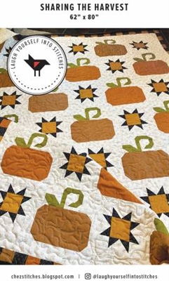 Sharing the Harvest  Pumpkin Quilt Pattern is a quilt featuring a pumpkin quilt block, repeated across the quilt.