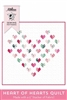 Heart of Heart Quilts Pattern by Melissa Mortenson shows a pretty, delicate heart quilt where the large heart is created by smaller heart blocks in shades of soft pink and green on a white ground.