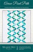 This quilt has a vertical design created by rows of half square triangles and is shown in shades of bright aqua and green on a white background.