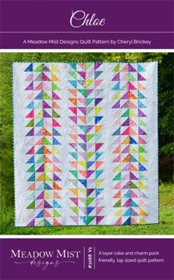 This very pretty quilt features a vertical strippy design sewn from half square triangles using charm packs or a layer cake in a bright and colorful quilt.
