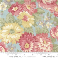 Lush packed medium scale floral in blues and yellows with rose accents