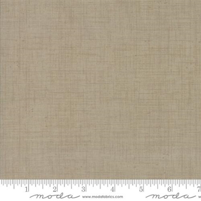 This is a swatch showing a taupe tan or brown fabric square
