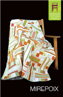 Dramatic pieced quilt made with light, medium and dark fabrics.