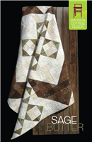Dramatic pieced quilt made with light, medium and dark fabrics.
