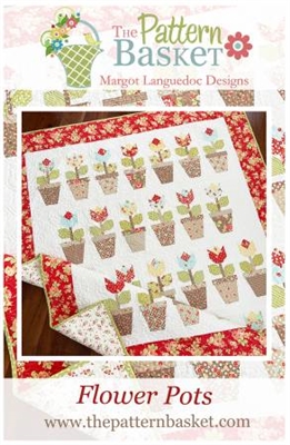 This quilt depicts rows of blooming flower pots with a charming floral border print, from The Pattern Basket