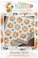 This quilt depicts rows of blooming flower pots with a charming floral border print, from The Pattern Basket