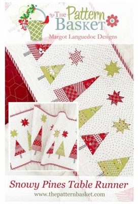 Snowy Pines Holiday Table Runner Pattern  by The Pattern Basket features red and green stars shining over red and green evergreen trees making this a perfect holiday table decoration.