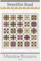 This quilt pattern shows a traditional pieced block with a center cross in a multicolor design, with five blocks across x five blocks down.