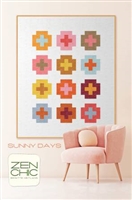 Large colorful chunky quilt  blocks stand out on a simple white background.