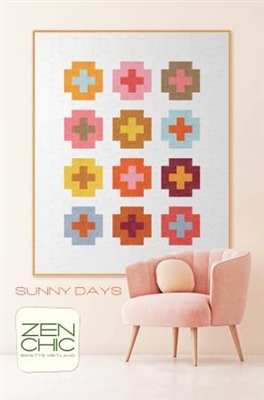 Large colorful chunky quilt  blocks stand out on a simple white background.